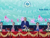 Thủ tướng Nguyễn Xuân Phúc phát biểu tại hội nghị. Ảnh: THỐNG NHẤT (TTXVN)